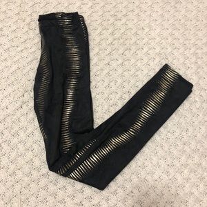 Gold and black leggings